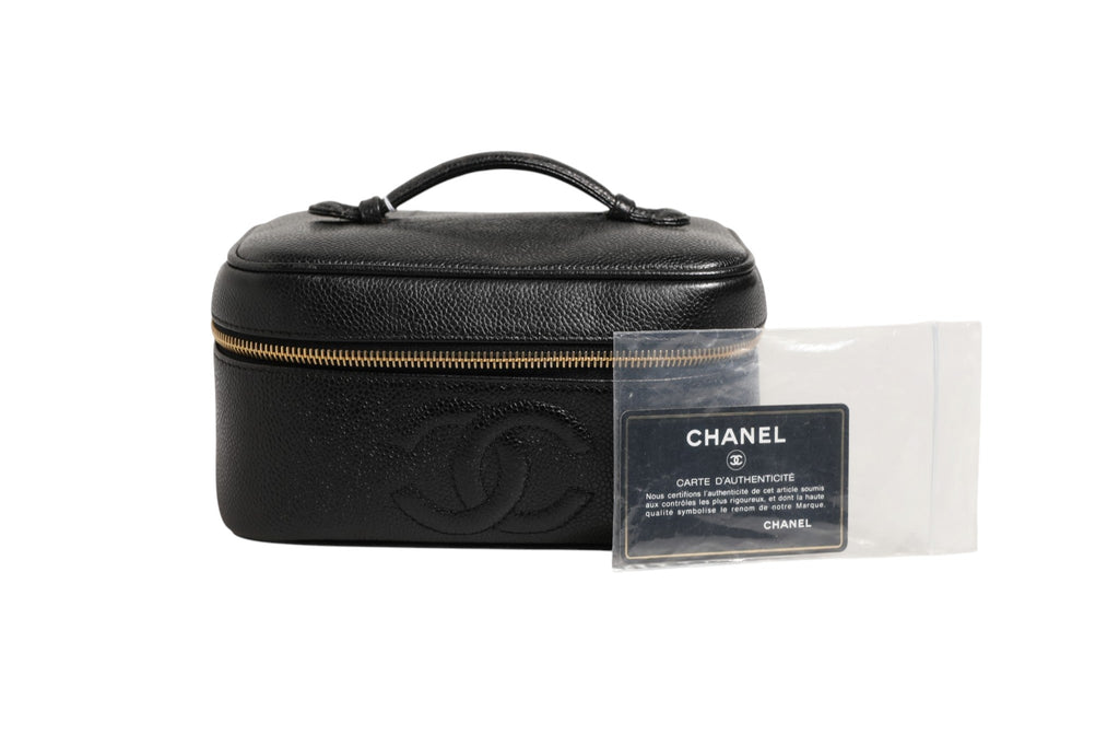 Chanel Black and gold makeup bag