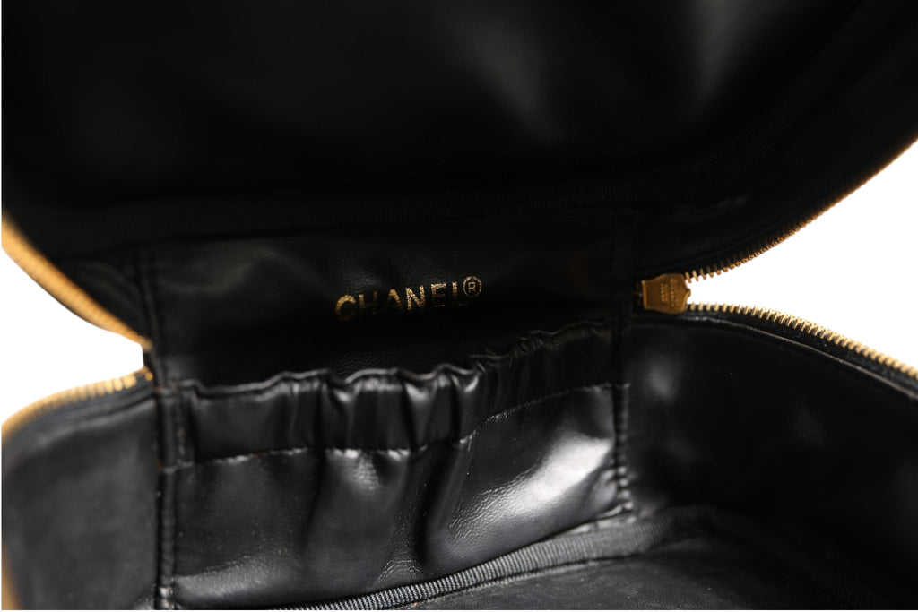 Chanel Black and gold makeup bag